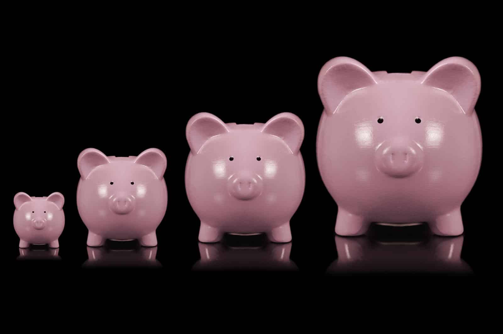 A conceptual image of growing your savings illustrated by piggy banks getting larger over time.